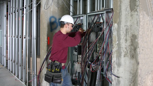 Man Fixing Electrical Wires